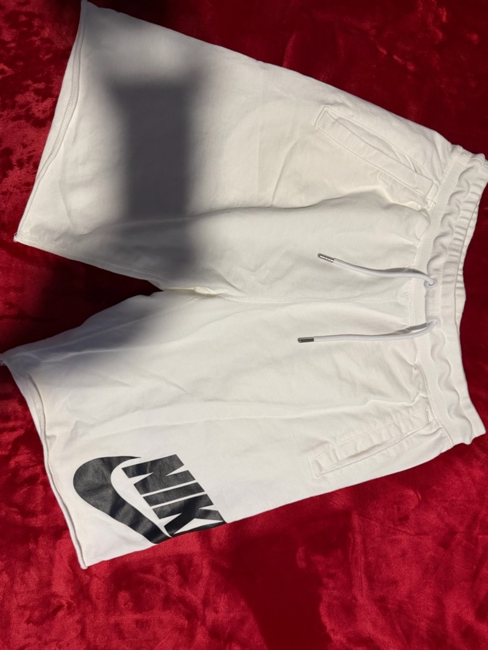 Nike Men’s White Athletic Shorts with Black Logo